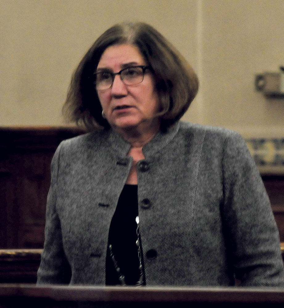 Assistant District Attorney Leanne Zainea walks back to her table following a sidebar with Justice Robert Murray and defense attorneys during the manslaughter trial of Miranda Hopkins of Troy in Waldo County Superior Court in Belfast on Monday.