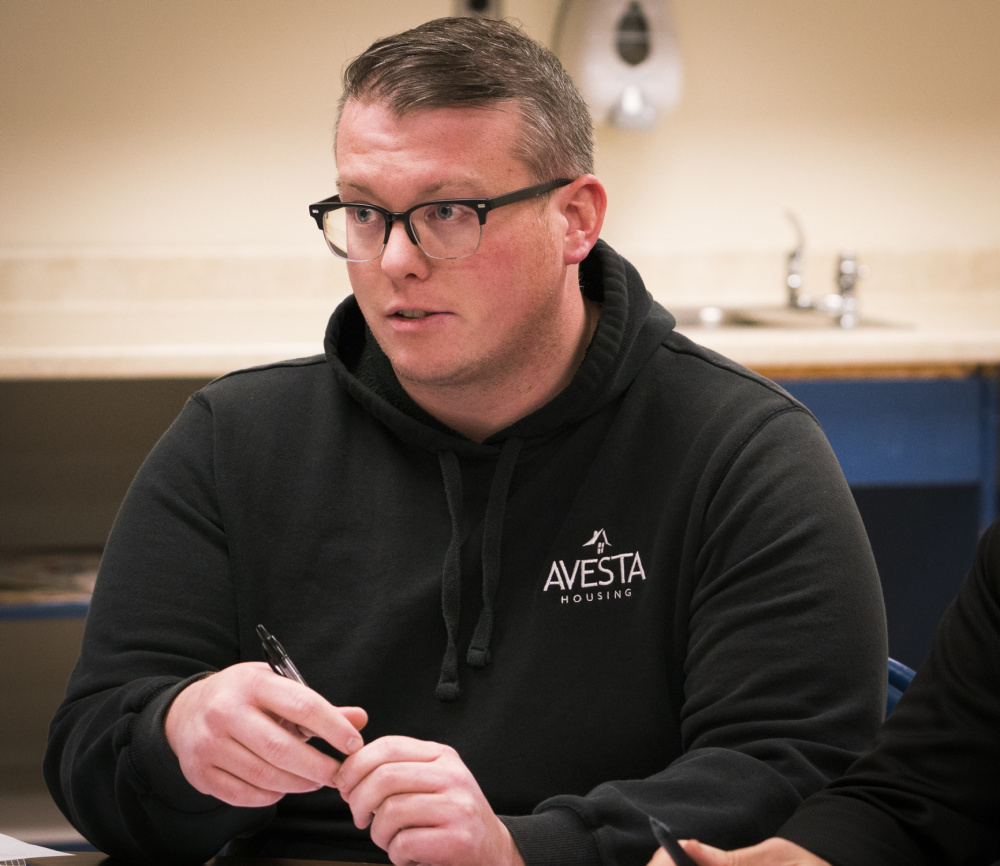 Matt Frost, a Randolph selectman, compliments TC Hamlin school officials Monday for maintaining the school during a period of uncertainty, during an ad-hoc committee meeting at the school.