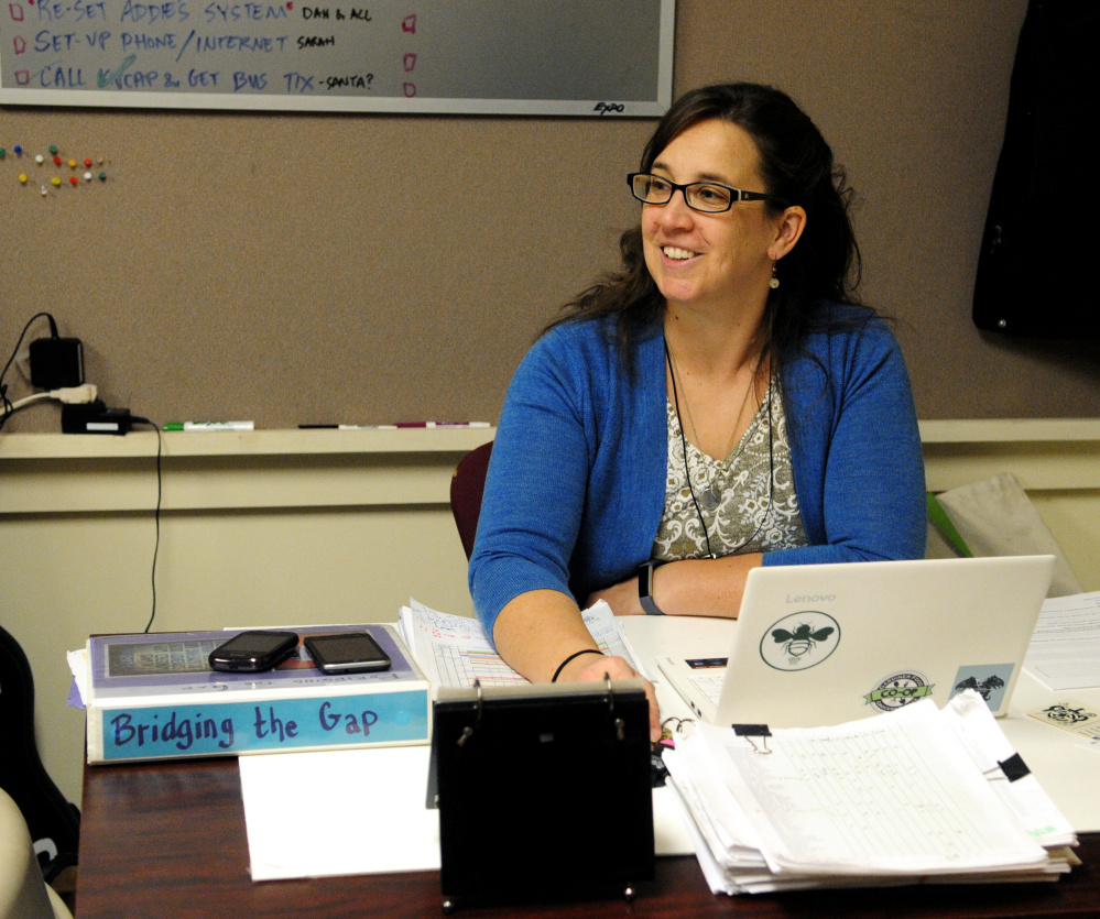 Sarah Miller, Bridging the Gap project director, talks about the Augusta Community Warming Center on Thursday at St. Mark's Parish Hall in Augusta.