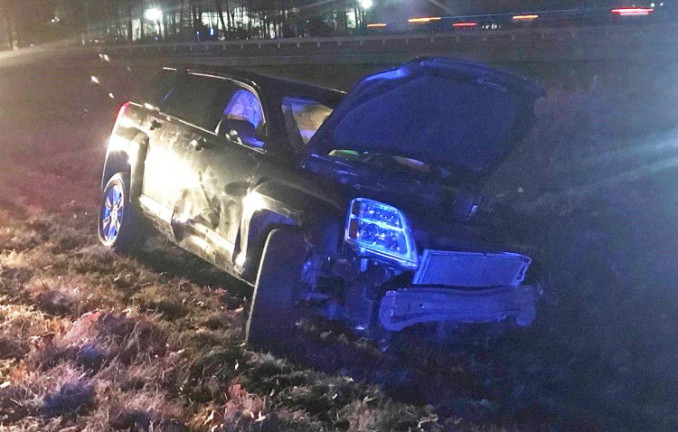 Maine State Police say Michael Messier crashed this SUV crashed at the Saco exit of the Maine Turnpike before fleeing into woods and leaving a toddler in the vehicle.