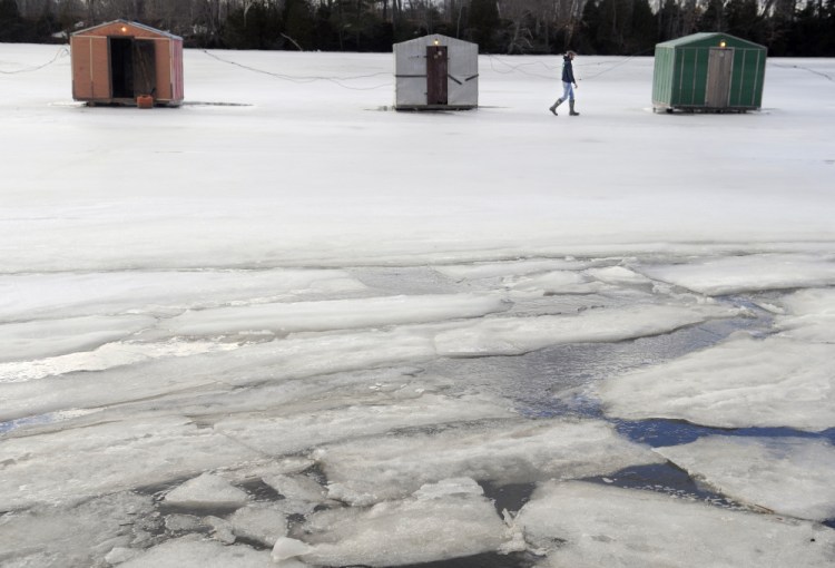 Peter James checks smelt shacks on the Eastern River in Dresden on Feb. 21, 2016. The Dresden Planning Board is reviewing plans for a proposed new smelt camp near Cork Cove in the Kennebec River.