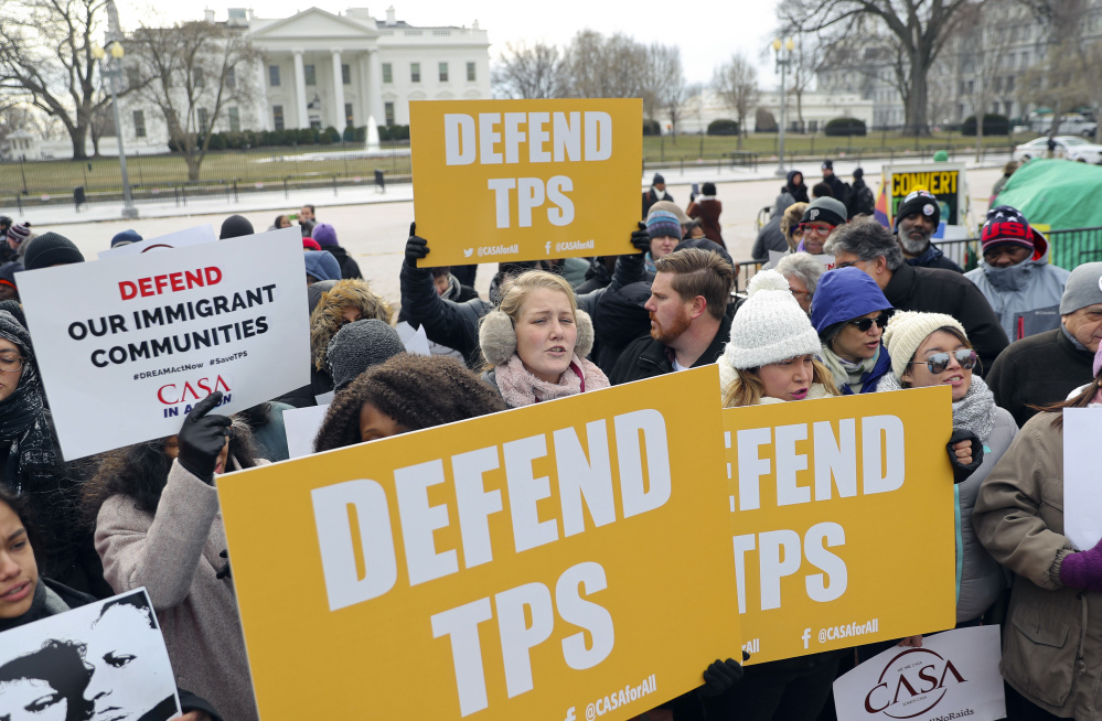 CASA de Maryland, an immigration advocacy organization, holds a rally in Lafayette Park across from the White House in Washington on Monday in reaction to the news regarding Temporary Protective Status for people from El Salvador.