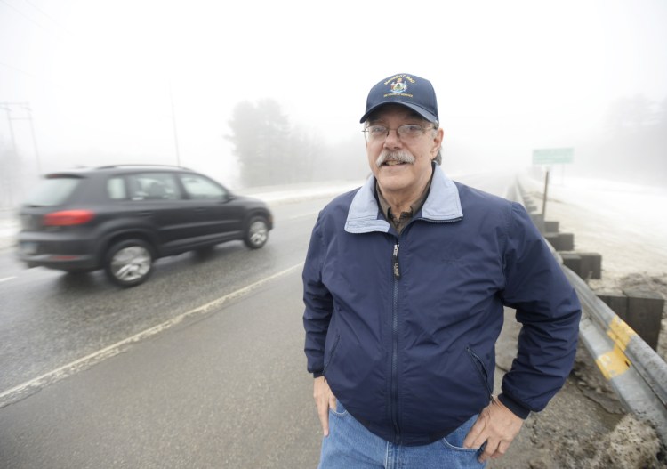 Bob Moosmann on the side of the road on the Scarborough Connector.