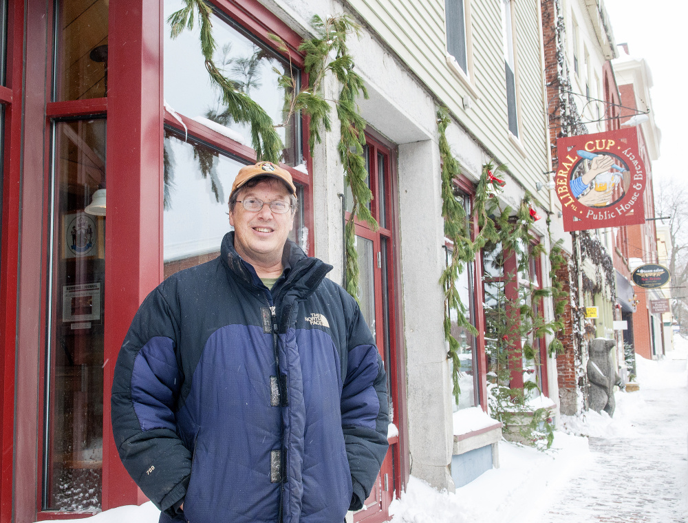 Restaurateur Geoff Houghton sits in his first brew pub, The Liberal Cup in Hallowell, on Friday. Houghton says he's concerned the upcoming Water Street construction project will result in significant sales losses that could hamper his "being able to keep my staff intact."