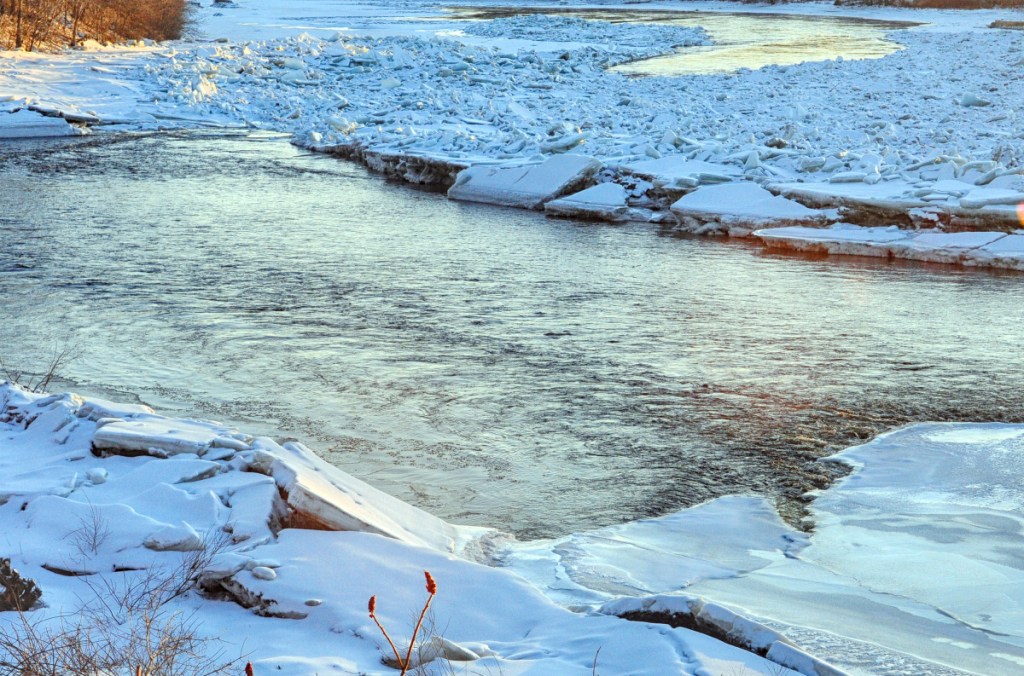 The Kennebec River is seen late Thursday afternoon flowing past an ice jam between Randolph and Farmingdale.