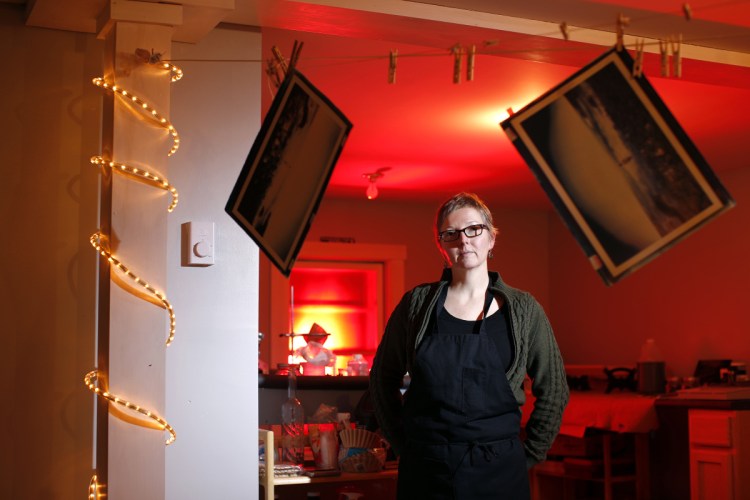 Deanna Witman in her studio at her home in Warren.