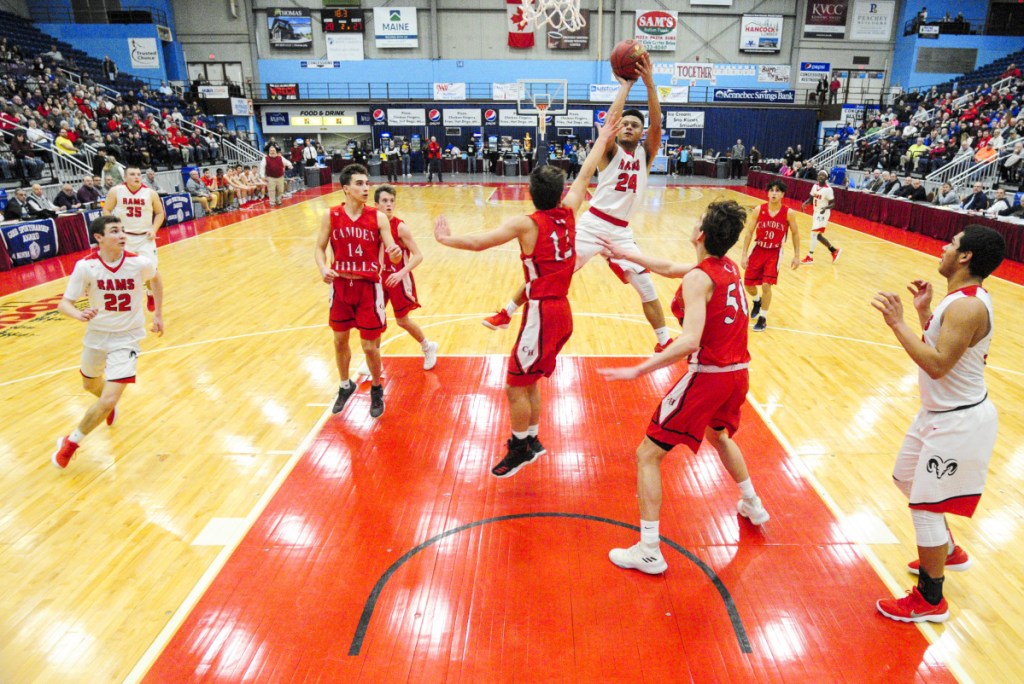 Cony senior guard Jordan Roddy shoots during a Class A North quarterfinal game against Camden on Saturday at the Augusta Civic Center.