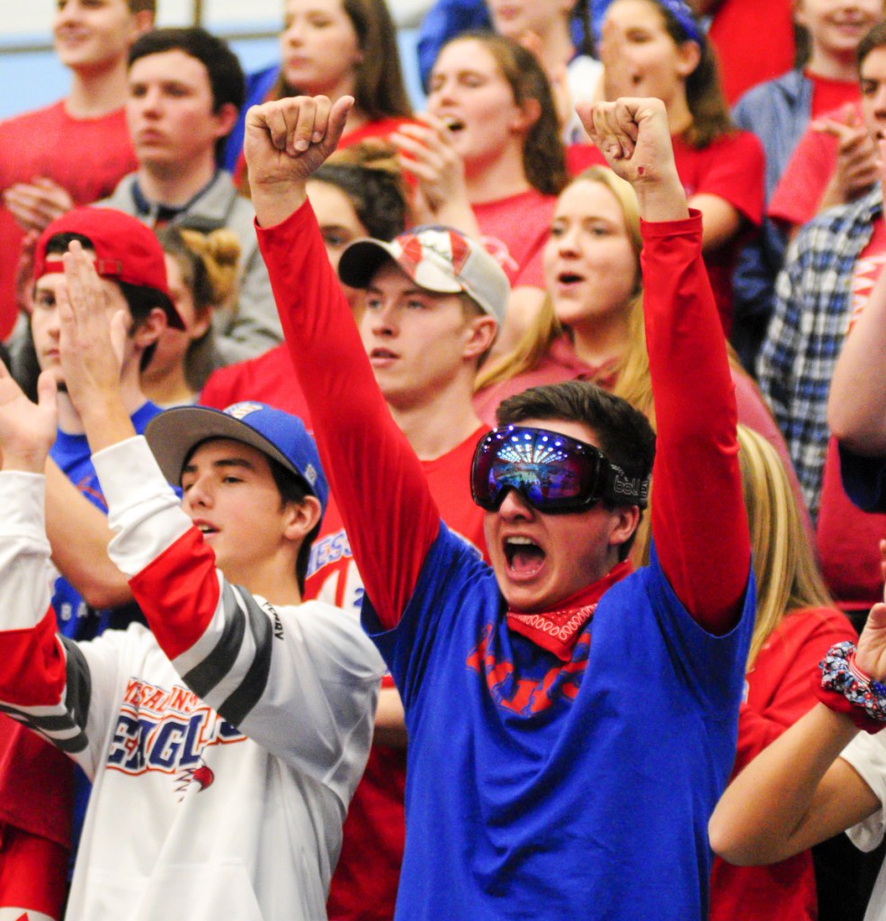 Messalonskee fans cheer on their Eagles during a Class A North semifinal game against Skowhegan on Wednesday at the Augusta Civic Center.