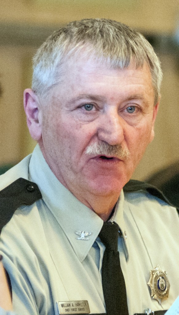 Maine Forest Service Chief Ranger Bill Hamilton answers question during a work session Tuesday on an online burn permit bill before the Committee On Agriculture, Conservation and Forestry in the Cross State Office Building in Augusta. The committee voted to endorse the bill, which seeks to clarify and tighten requirements for issuing online burn permits in Maine.