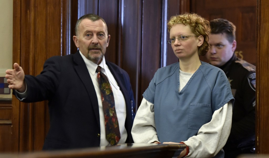 Murder defendant Sharon Carrillo of Stockton Springs is led into Waldo Superior Court in Belfast on February 28. Carrillo and her husband, Julio Carrillo, are charged in the death of her 10-year-old daughter, Marissa Kennedy, last weekend.