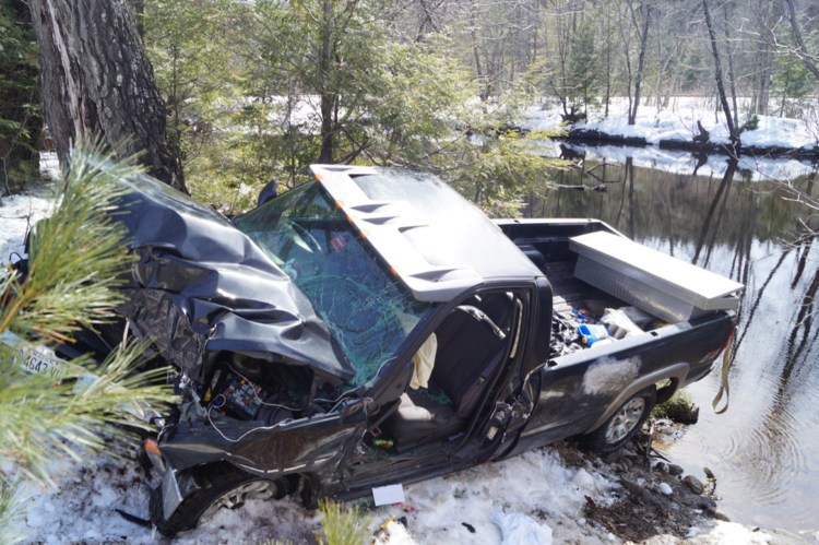 Robert Owens, 56, of Greenwood was extricated from his smoking pickup truck Tuesday afternoon after it crashed in West Paris.