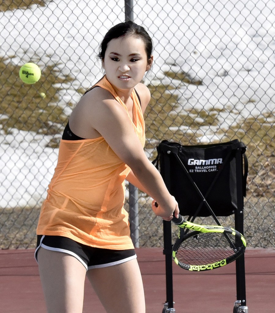 Erskine Academy's Ellie Hodgkin returns a shot during practice Wednesday in South China.