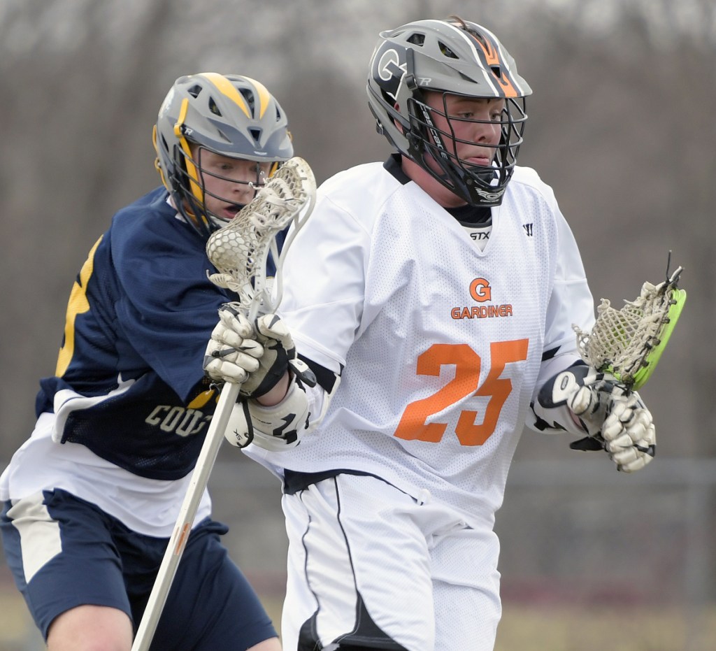 Gardiner's Cody Rizzo, right, is chased down by Mt. Blue's Levi Hiltz during a game Thursday in Gardiner.