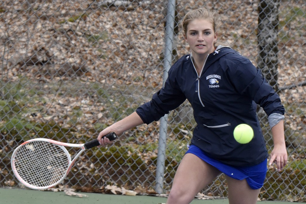 Messalonskee's Elena Guarino returns a shot against Cony on Monday in Belgrade.