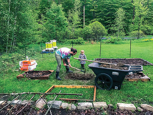 Fairfields of all ages are busy working in the raised bed garden plots. Photos courtesy of 
Brittney Fairfield