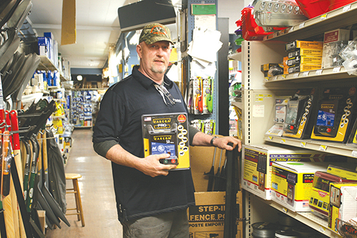 Larry Donald, manager of Farmington Farmer’s Union, and his staff, help their customers sort out the many choices and decisions to be made before installing an electric fence.  After gathering important information about the terrain, the animals to be kept in or out and the size of the property to be fenced, they can put together a complete package of electric fence materials. Valerie Tucker photo