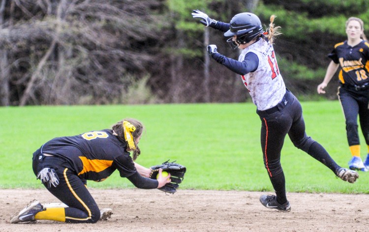 Marancook shortstop Amanda Goucher, left, has ball at second but Winslow baserunner Kaylee Jones goes around her to avoid the tag during a game Friday in Readfield.