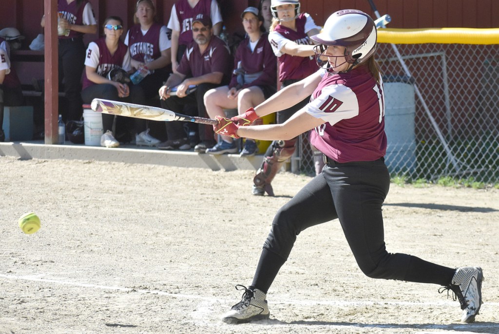 Monmouth's Haylee Langlois hits a grounder for a single during a Mountain Valley Conference game against Oak Hill on Friday.