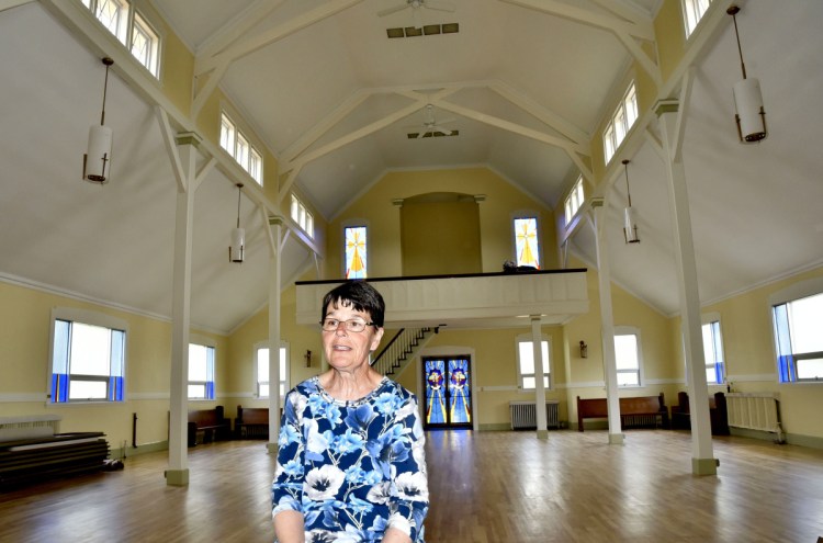 Staff photo by David Leaming
Rachel Kilbride stands on Thursday in the nearly finished interior of the former St. Bridget Catholic Church in Vassalboro. Kilbride and her husband have transformed the building into St. Bridget Center. The building will be available for community events and also can be rented for functions. The first event will be the Senior Services fair on Wednesday.