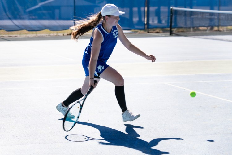 Breanna Kanagy of Madison returns a shot to Hall-Dale's Maggie Gross during a singles match of a Class C South quarterfinal Thursday in Madison.