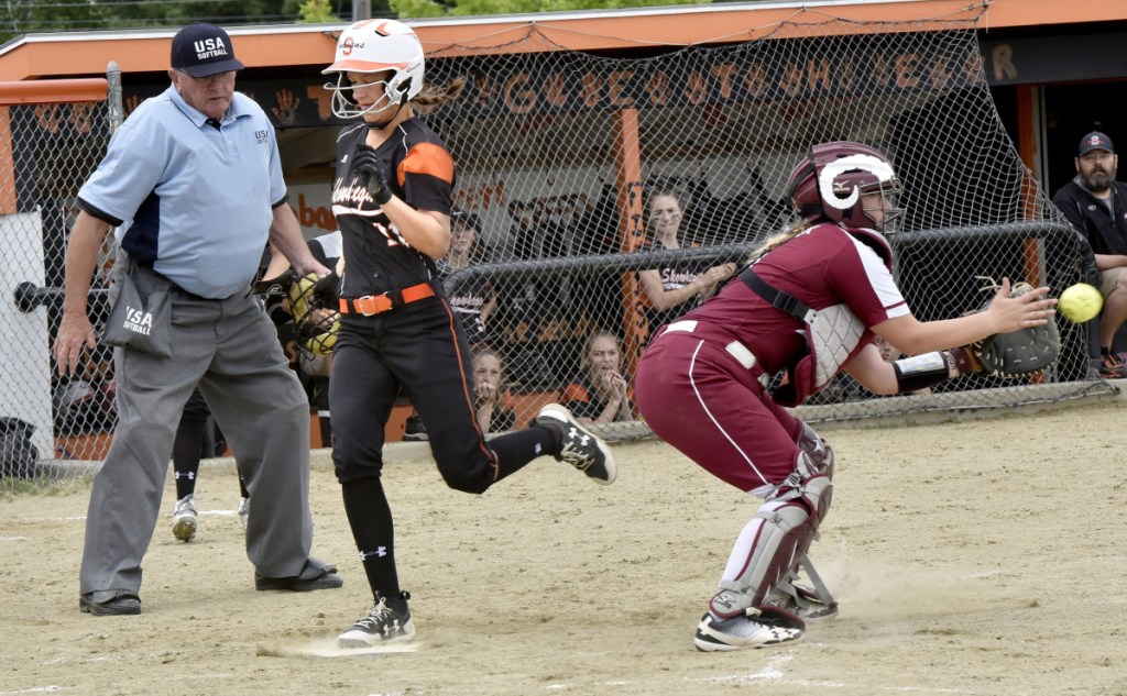 Skowhegan's Alyssa Everett crosses home plate during a Class A North quarterfinal game against Bangor on Thursday in Skowhegan.