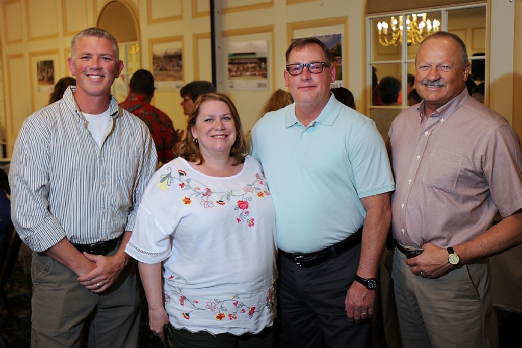 Camp POSTCARD volunteers, from left, are Scott Stewart, Joanne Mason, Ken Mason and Naldo Gagnon.