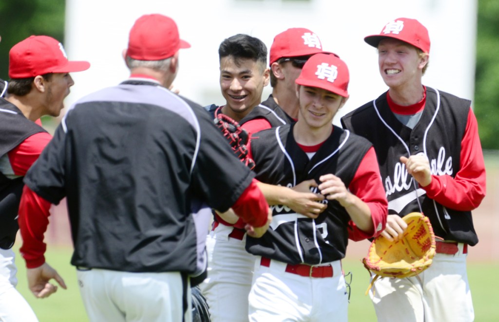 The Hall-Dale baseball team celebrates after it beat Bridgeway 7-4 in a Class C South semifinal Saturday in Farmingdale.