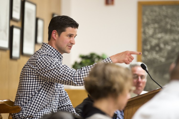 Waterville Mayor Nick Isgro points to City Manager Mike Roy while interrupting him after Roy was asked to clarify the outdoor dining ordinance during a budget meeting this month in the City Council chamber at The Center. Isgro survived a recall in Tuesday's election.