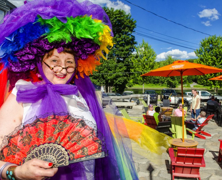 Sparky Lindsey models the hat she made for this weekend's Hallowell Pride festivities on Thursday at the Quarry Tap Room in Hallowell.