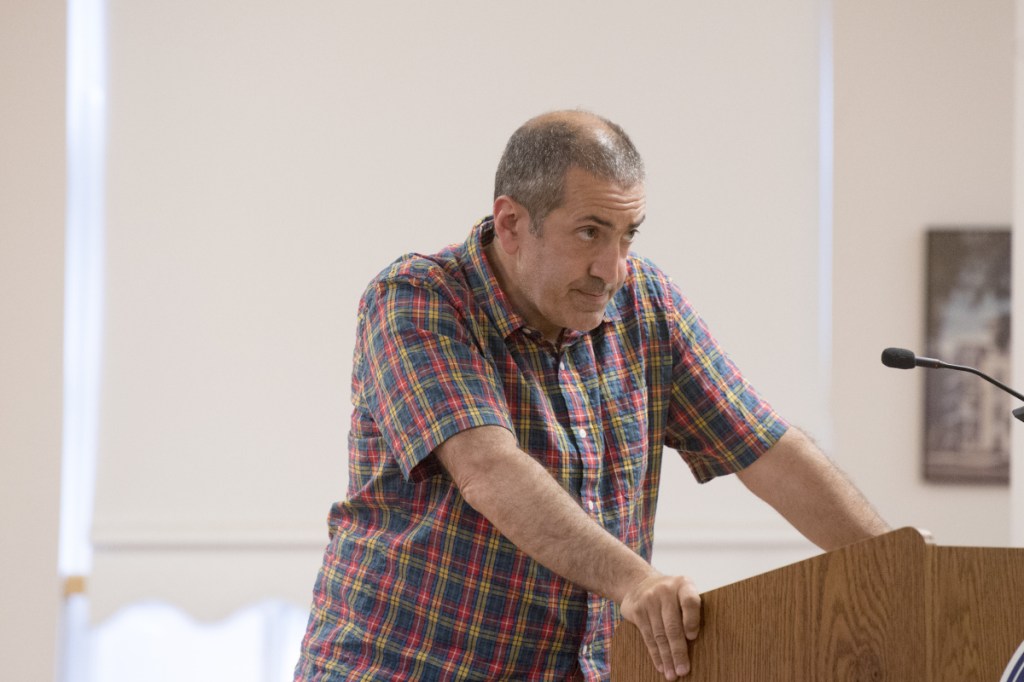 Tom Ferris challenges a comment made by Councilor Sydney Mayhew, R-Ward 4, about the prospective decrease in property taxes if the council were to reduce the city and school budgets by $100,000 each. The encounter took place during a special council budget meeting in the City Council chamber at The Center in Waterville.