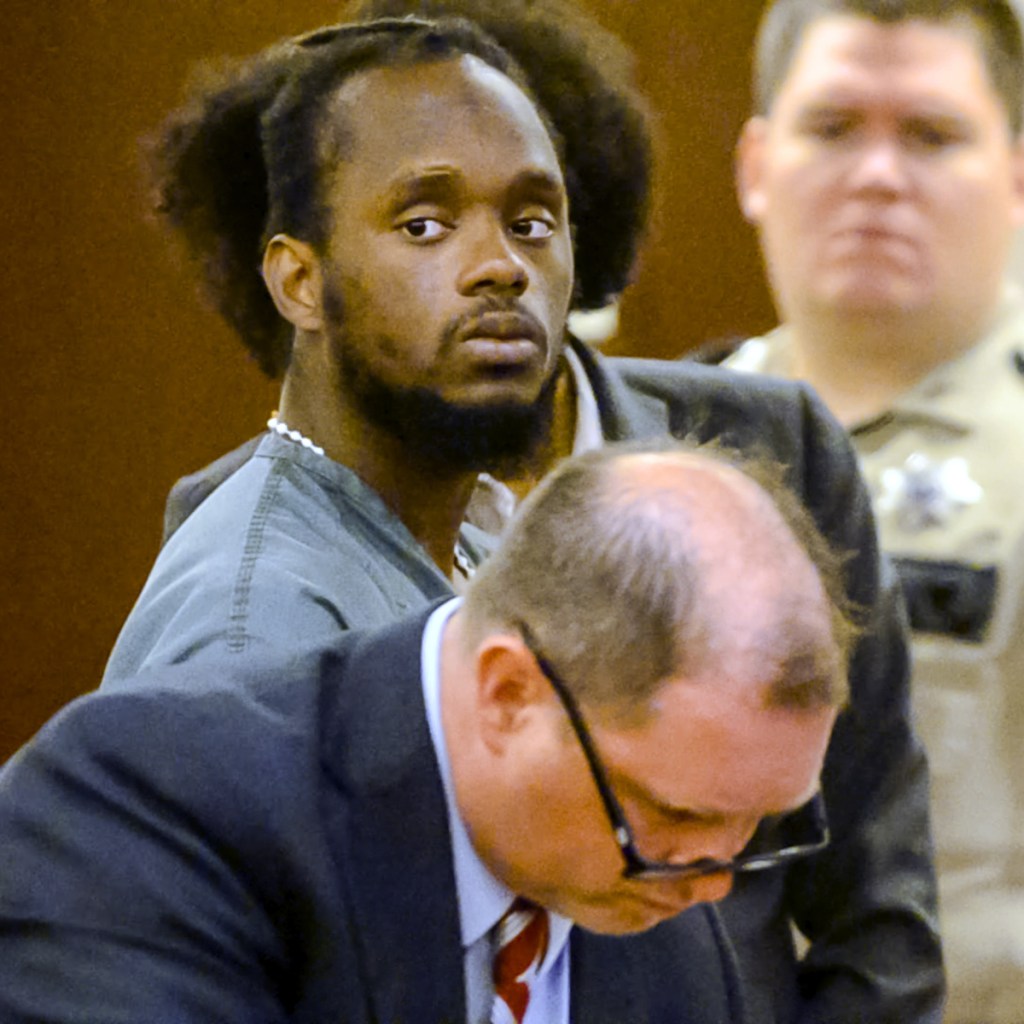 Attorney Brad Grant, bottom, and defendant Aubrey Armstrong, are shown after Armstrong's sentencing for felony murder and robbery Friday at the Capital Judicial Center in Augusta. Armstrong was sentenced to 30 years in prison in connection with the killing of Joseph Marceau, of Augusta.