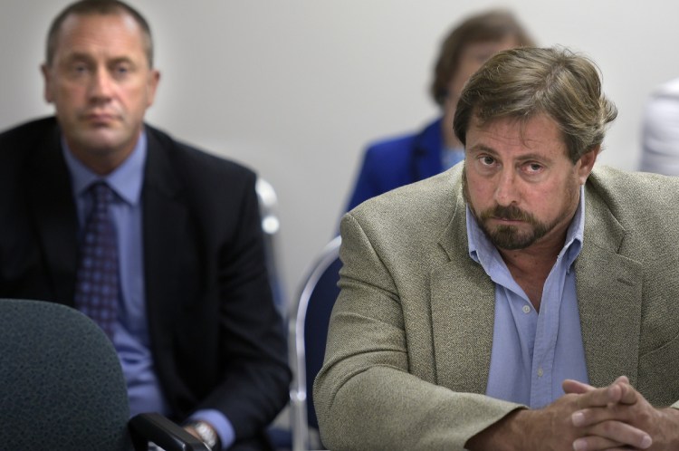 Mark Andre, right, argues July 25 for a release of Clean Election money to run as the Republican candidate for the House of Representatives in Oakland. Josh Tardy, left, an attorney for Senate Republicans, argued that the State Ethics Commission in Augusta should make the money available.