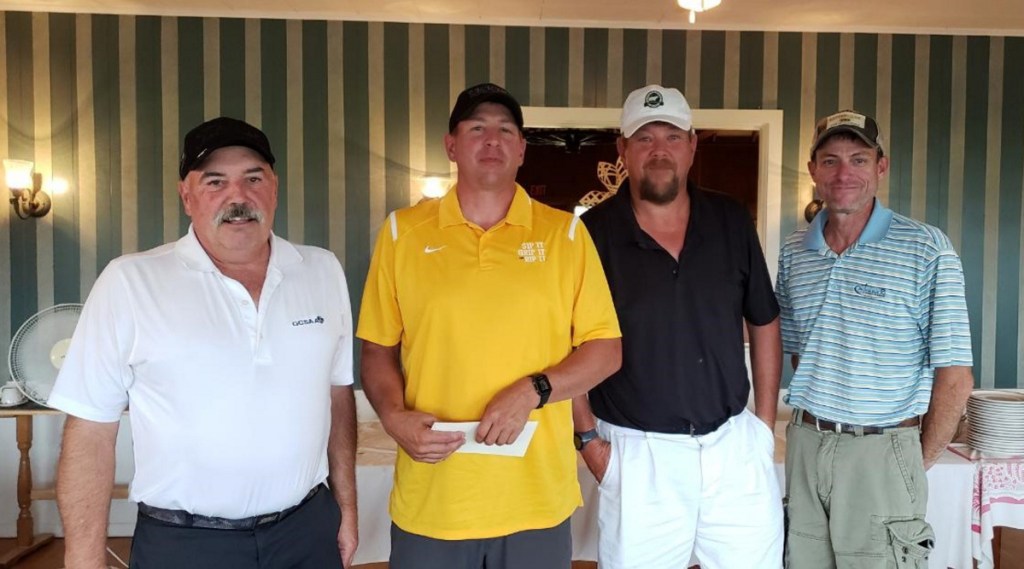 First place — men's A division winners, from left, are Kyle Ladd, Erin Washington, Larry Washington and Noel Dolbier.