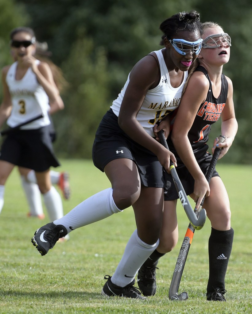 Maranacook's Jackie Gordon, left, collides with Gardine's Sada Chaisson during a game Thursday in Readfield.