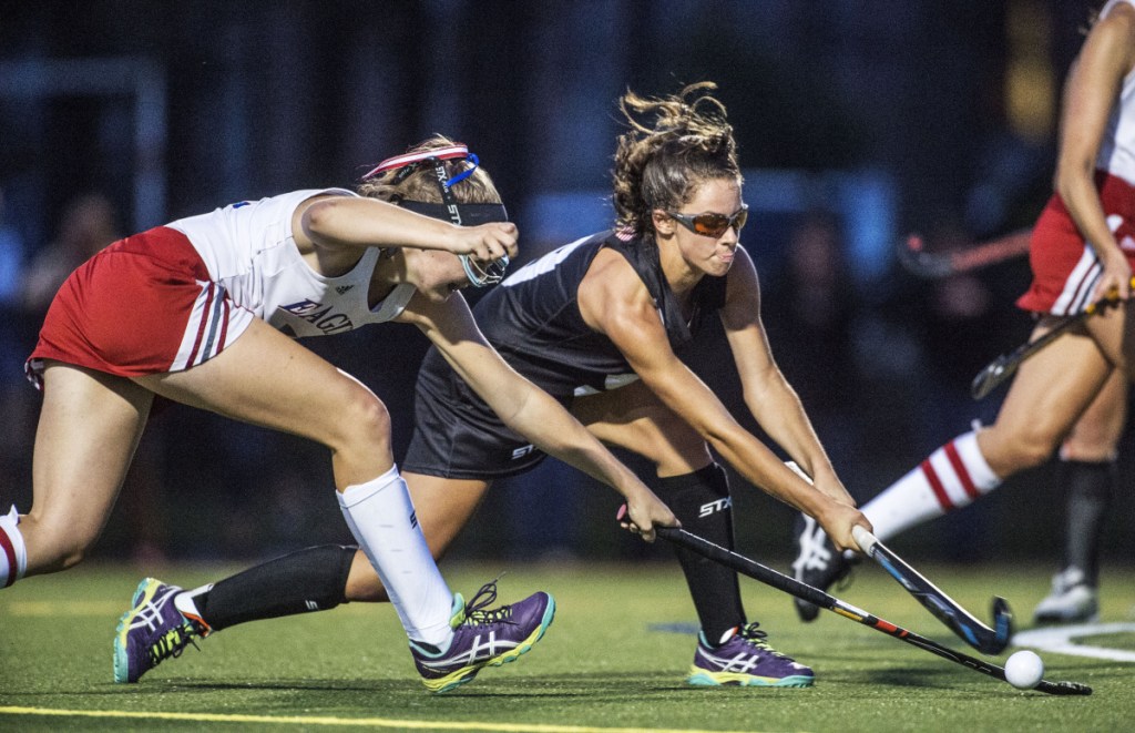 Skowhegan's Maliea Kelso, right, gets off a shot on the Messalonskee cage as Autumn Littlefield defends during a Class A North game last season at Thomas College in Waterville.