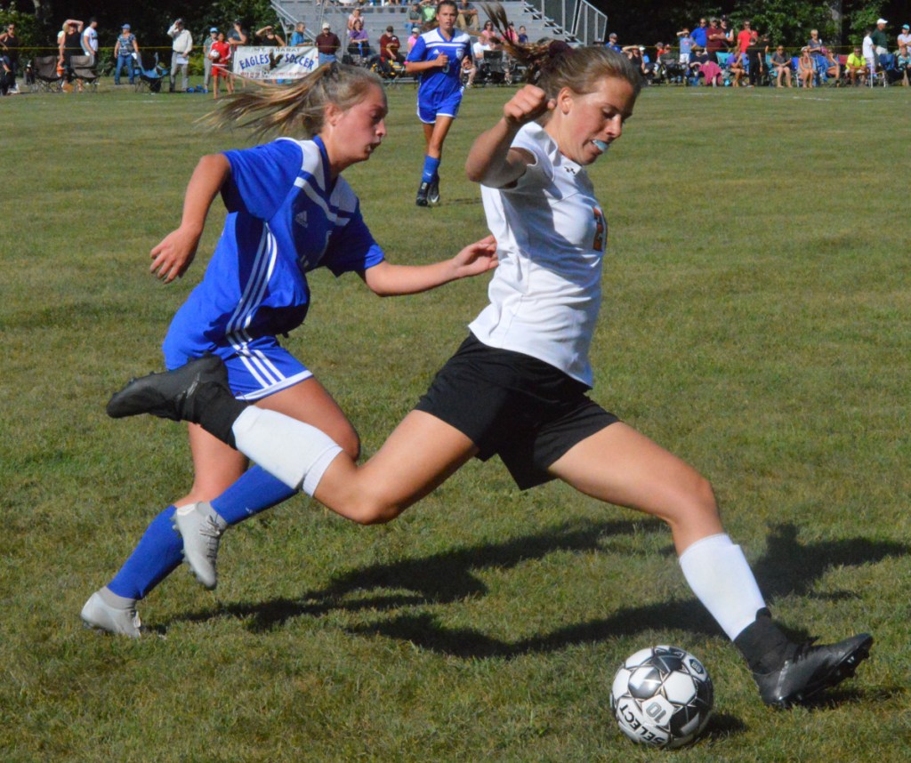 Skowhegan's Annie Cook legs the ball down the field during a game against Mt. Ararat in Topsham on Friday afternoon.