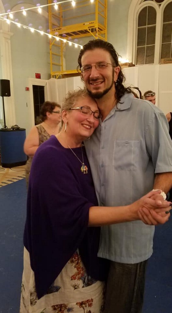 Carla McGuire and her son Anthony Johnston at Carla's going-away party. Photo by Connie Sharisky