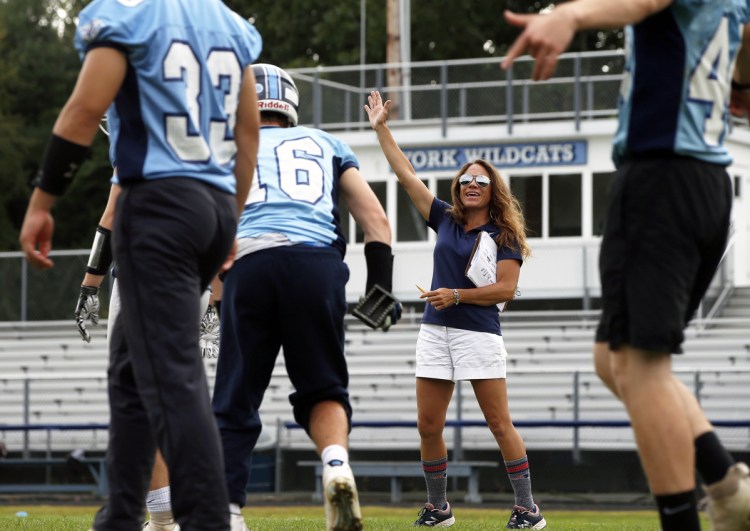 York assistant football coach Lynzi Pacitti during a special teams drill after a successful field goal during a recent practice. 