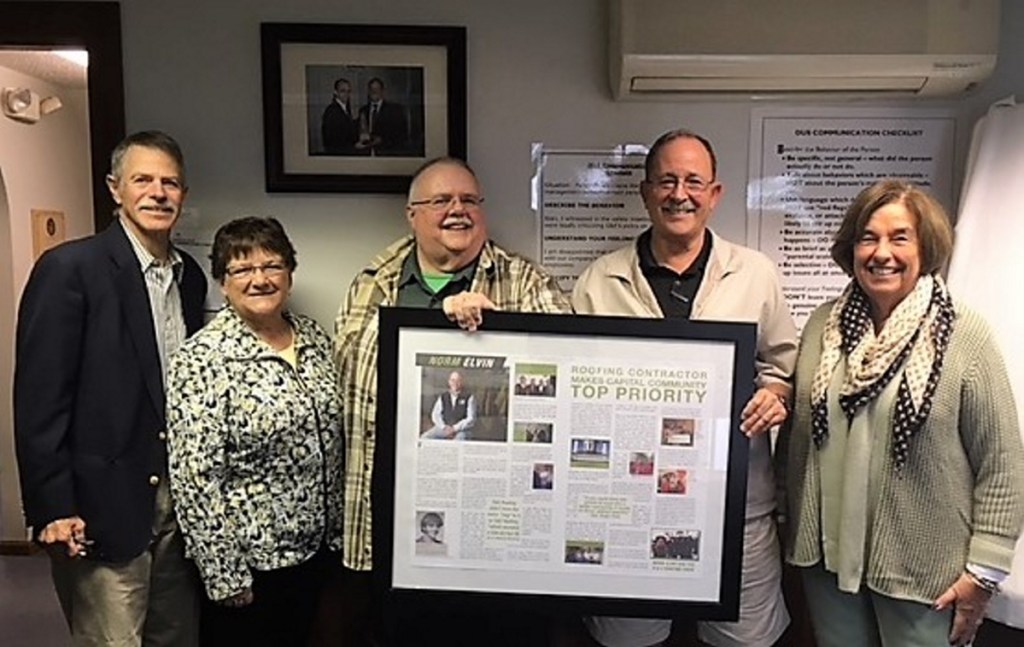 From left are Kennebec Historical Society members Glenn Adams, Nancy Merrick and Roger Pomerleau, G&E Roofing founder Norm Elvin, and KHS President Patsy Crockett.