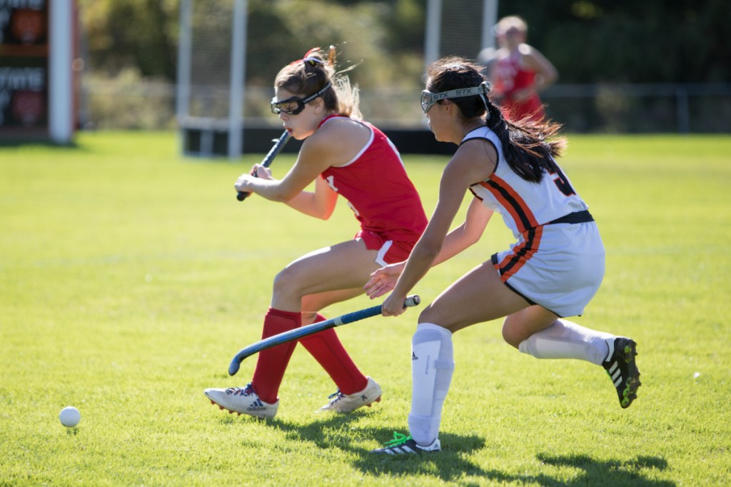 Cony senior Sydney Avery, left, gets ready to take a shot as Gardiner senior Sarah Foust defends during a game Saturday in Gardiner.