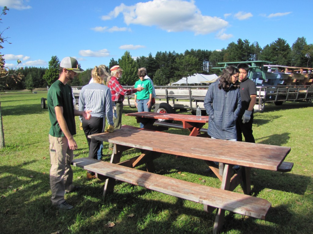 John McIntire, third from left, UBR board member, leading Unity College students for a post Common Ground Fair clean up at MOFGA.