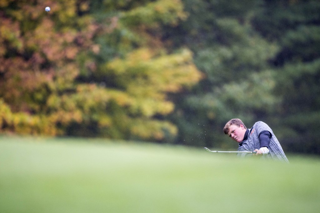 Staff photo by Michael G. Seamans 
 Gardiner's Cody Rizzo follows his shot from the 15th green at Natanis Golf Course in Norridgewock on Oct. 2.