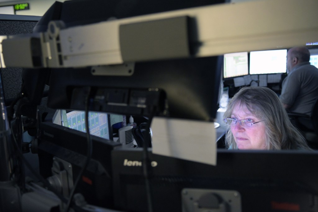 Department of Public Safety dispatchers communicate July 26 with firefighters, police and rescue workers at the state-run Augusta agency.