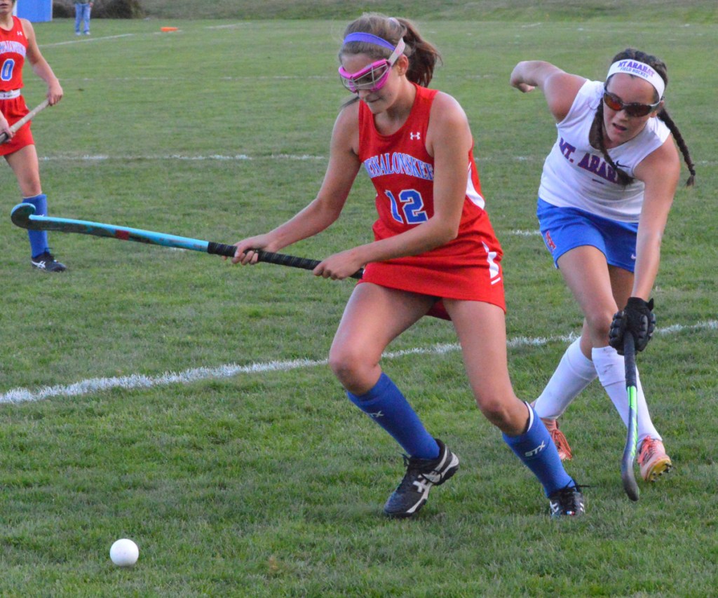 Messalonskee's Sarah Kohl, left, prepares to shoot as Mt. Ararat's Holly Temple defends during a Class A North quarterfinal game Wednesday in Topsham.