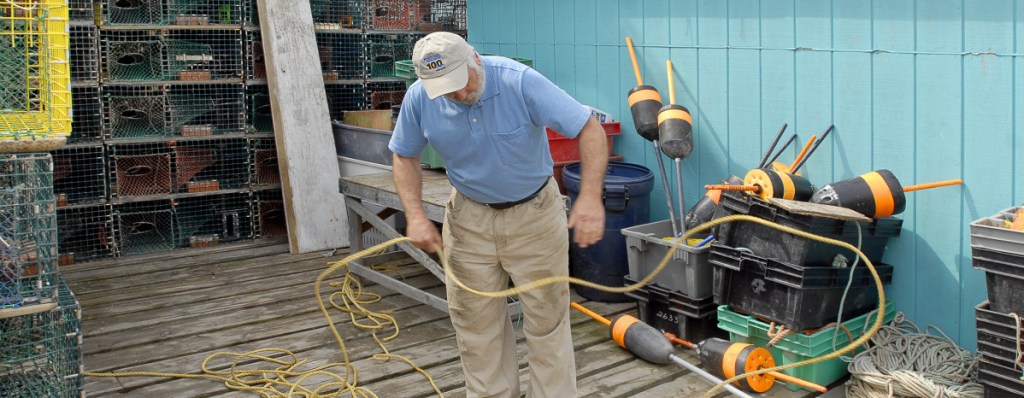 Lobstermen talk on Union and Widgery wharves about the effect of regulations on their industry in 2008.