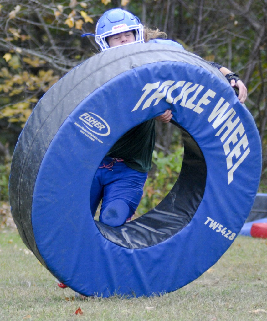 Oak Hill linebacker Ethan Richard works through a drill during a practice last month in Wales.