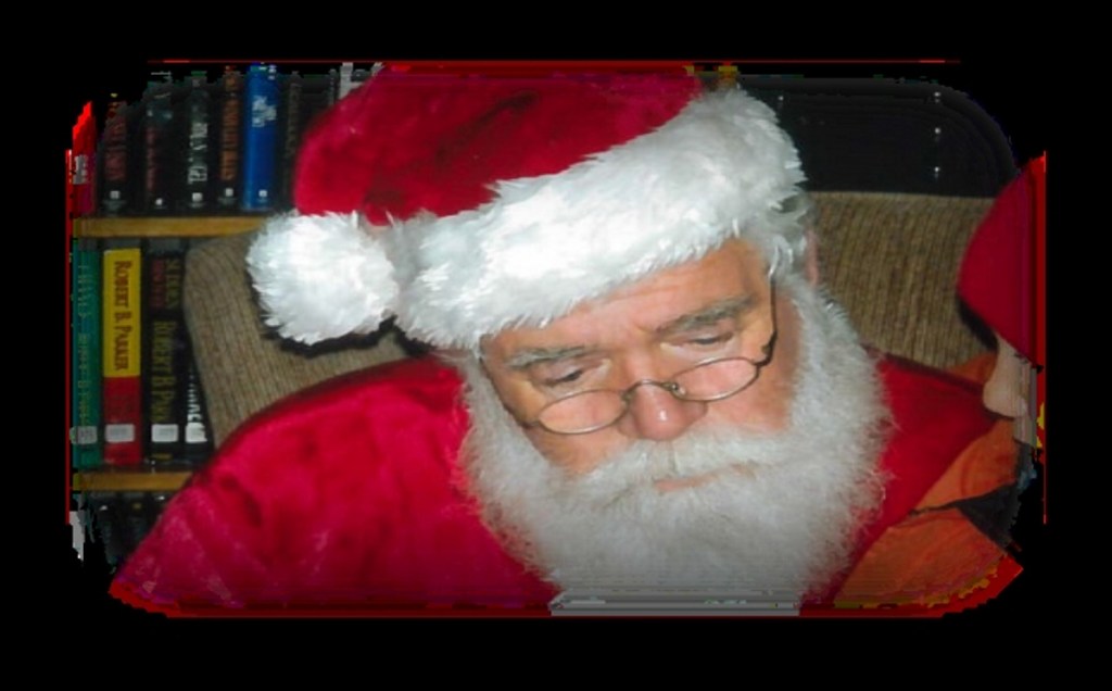 Santa Claus meets with children after the parade last year at the Madison Public Library.