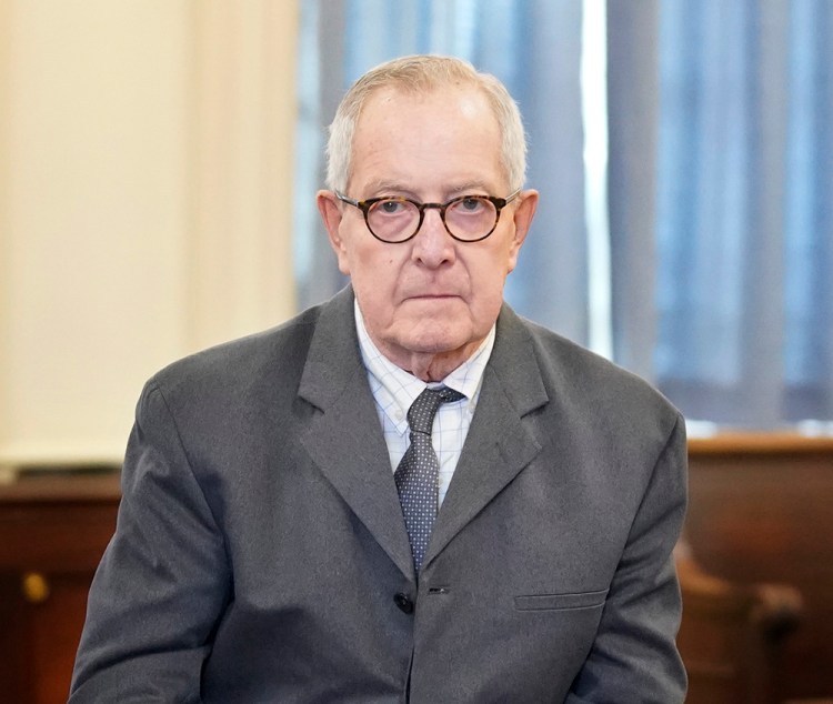 Ronald Paquin, 76, leaves York County Superior Court in Alfred on Nov. 29. The jury convicted him of 11 of 24 counts of gross sexual misconduct against one boy, but he was found not guilty of similar charges related to a second boy.