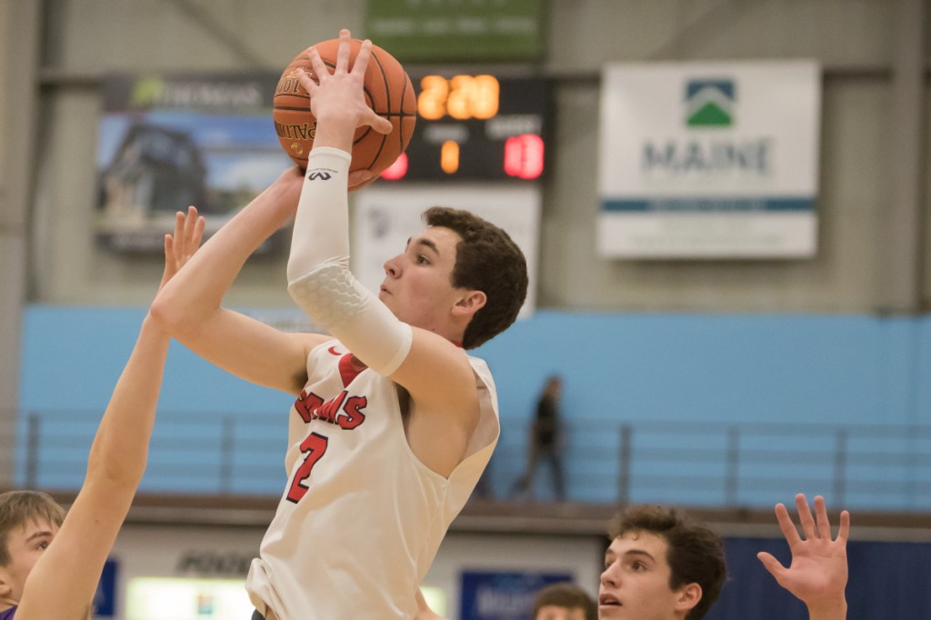 Cony's Dakota Dearborn makes a 3 pointer against Waterville during the Captial City Hoop Classic on Saturday at the Augusta Civic Center.