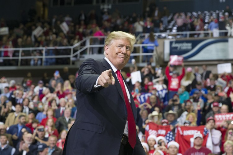President Trump points to a supporter as he departs a rally at the Mississippi Coast Coliseum in Biloxi, Miss. in November of 2018. Trump's campaign has launched a state-by-state effort to prevent an intraparty fight that could spill over into the general-election campaign. The initiative includes changing state party rules, crowding out potential rivals and quelling any early signs of opposition.